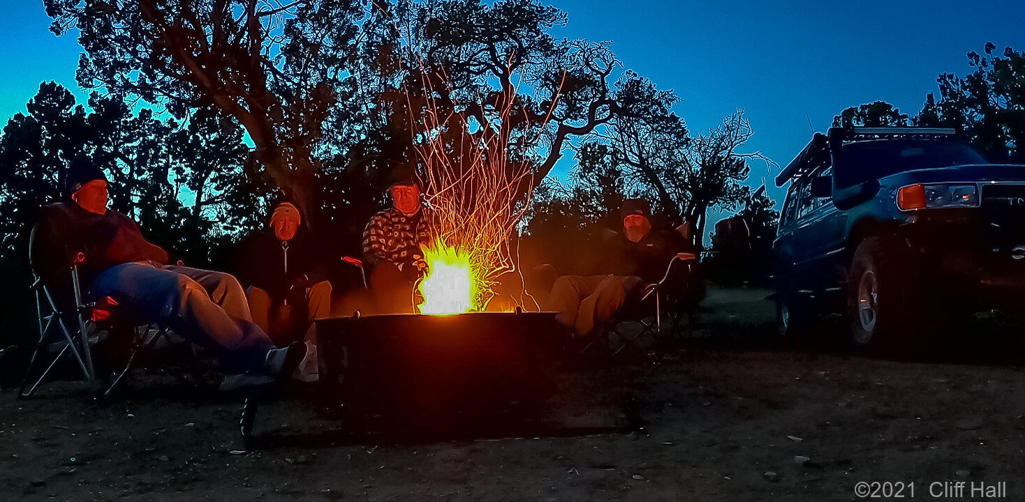 Cliff, Duc, Don and Ben have a good fire going